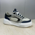 Fendi unisex sneakers side view, light gray leather with navy side stripe and laces