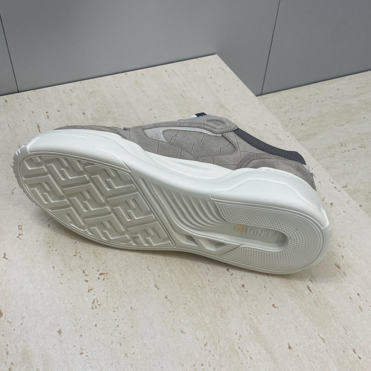 Fendi unisex sneakers outsole, gray-taupe upper with white rubber tread pattern