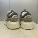 Fendi unisex sneakers, rear view, gray-taupe uppers with FENDI on heel tabs