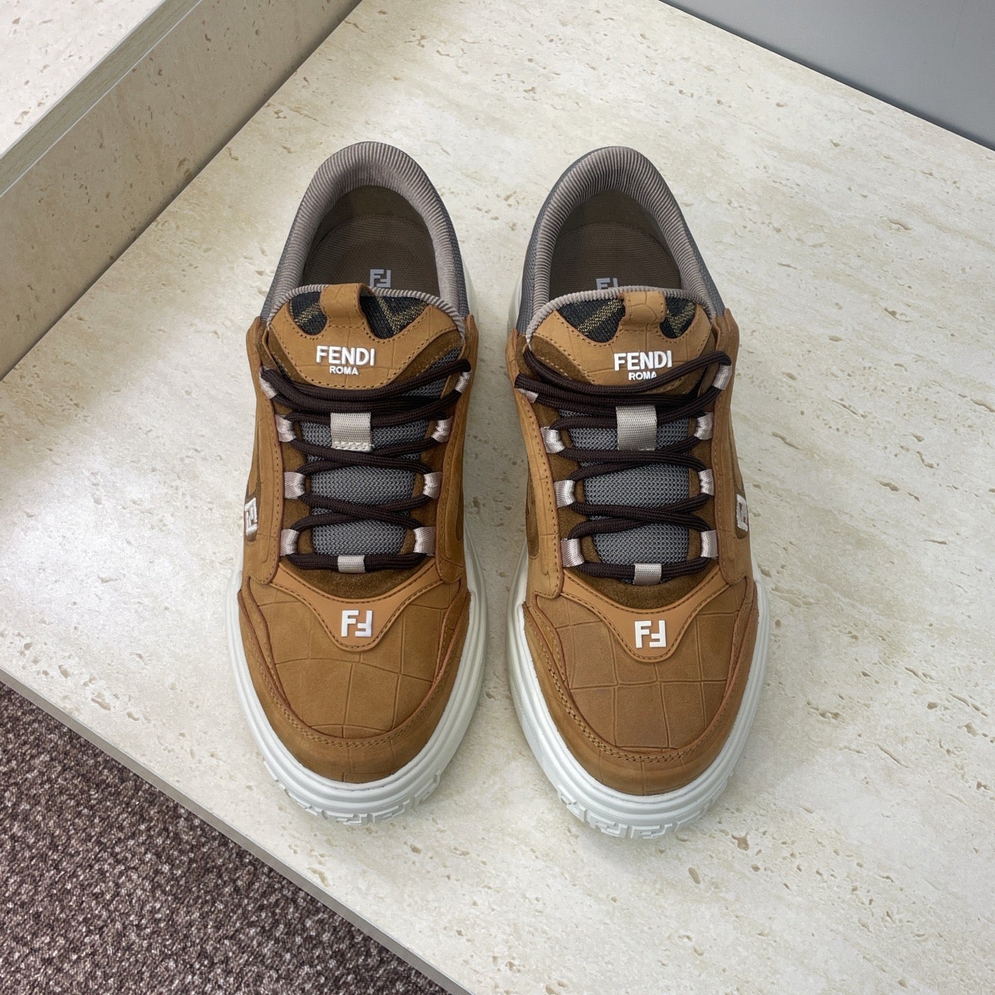 Fendi unisex sneakers in tan with gray collar, black-and-white laces, white rubber sole