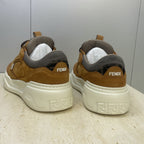 Back view of tan Fendi unisex sneakers with gray heel collar and white soles