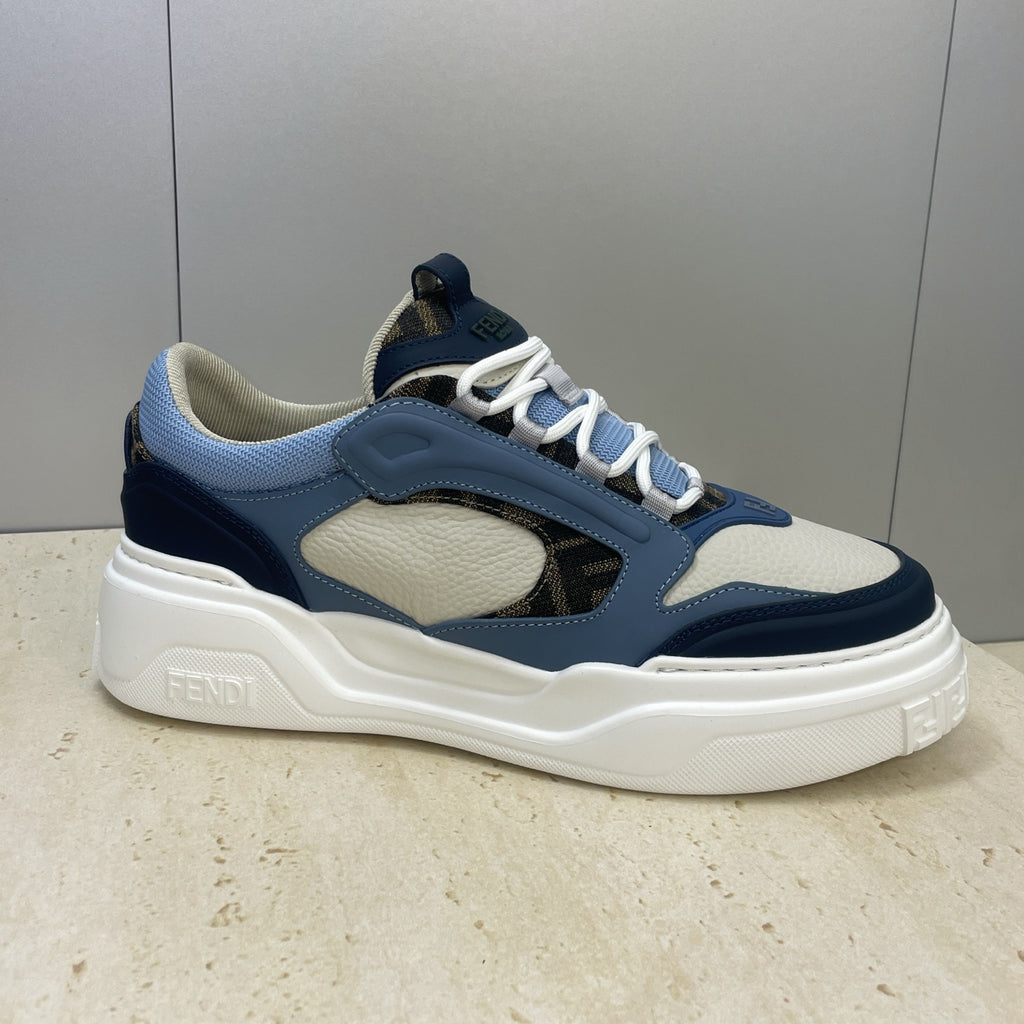 Fendi unisex sneakers angled, light blue collar and uppers, navy trim, white midsole