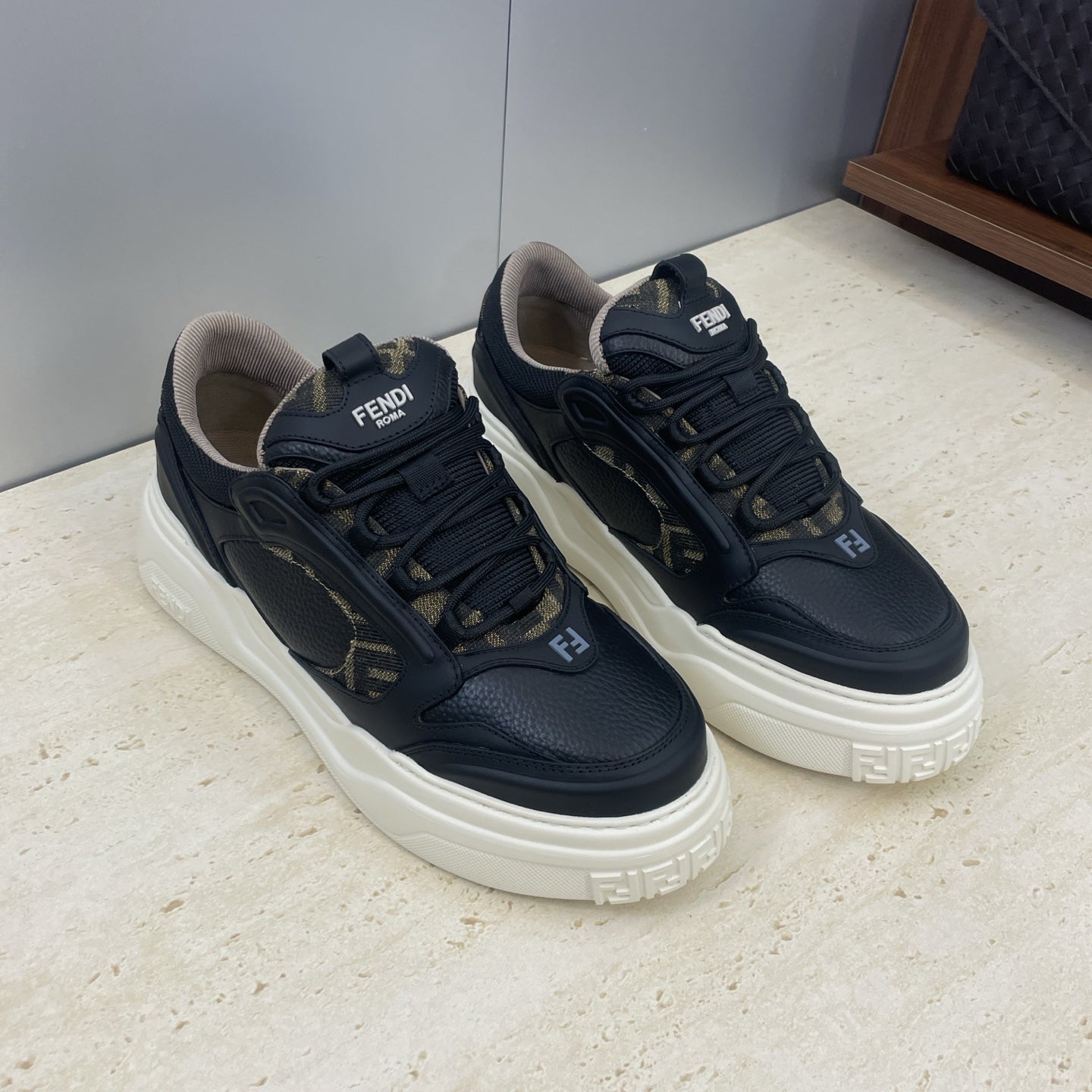 Fendi unisex sneakers, dark navy uppers with gold monogram accents and white midsoles