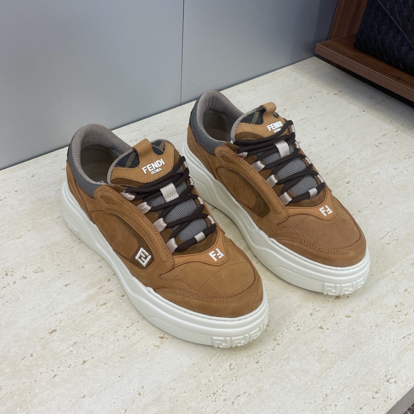 Fendi unisex low-top sneakers, tan leather with gray mesh collar and white platform sole