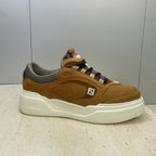 Tan Fendi unisex sneaker with gray collar, lace-up design, and white midsole