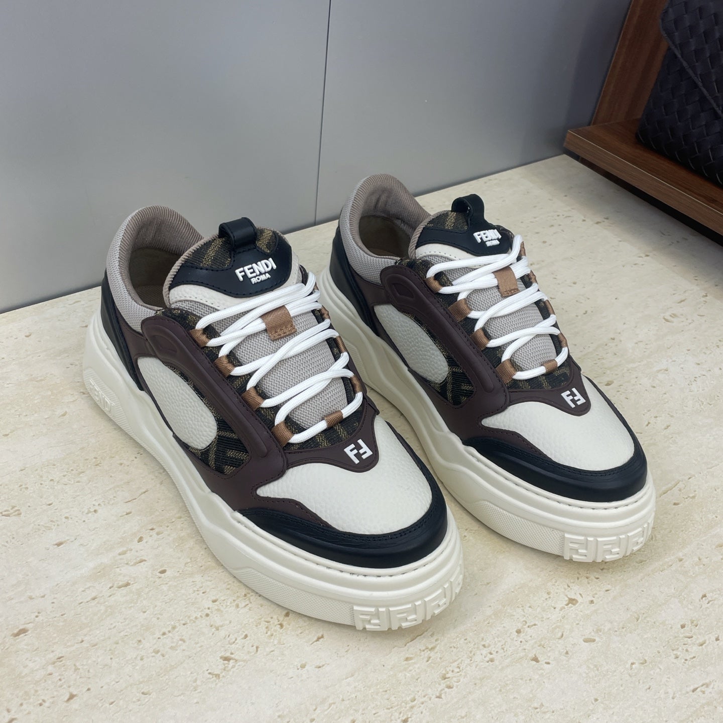 Unisex sneakers, white panels with dark brown uppers and navy trim