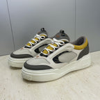 Fendi unisex sneakers, cream-white rubber sole with white laces, yellow and dark gray accents