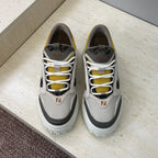 Fendi unisex sneakers, light gray with white laces and yellow accents, black details