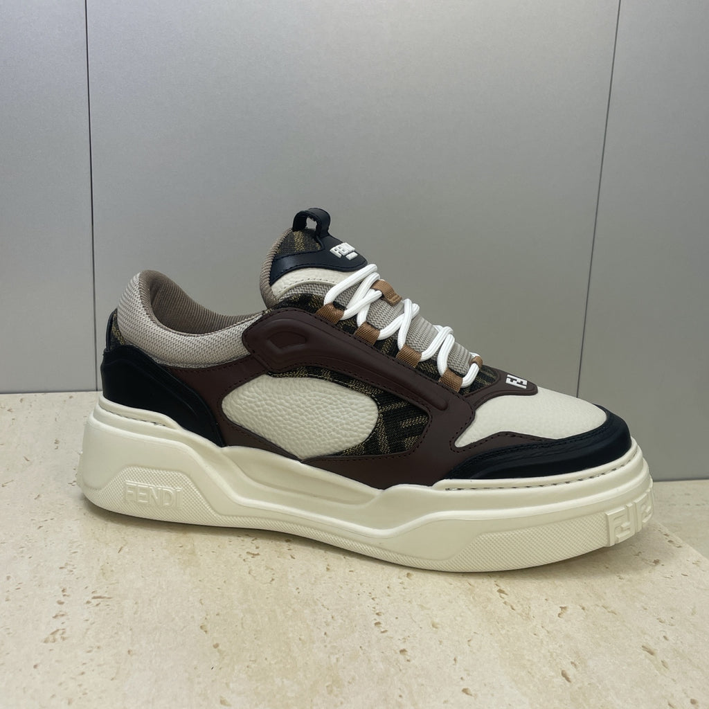 Unisex sneakers profile, white and dark brown with navy side panel and cream sole
