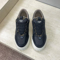 Fendi unisex sneakers in dark navy leather with gold logo detail, white sole