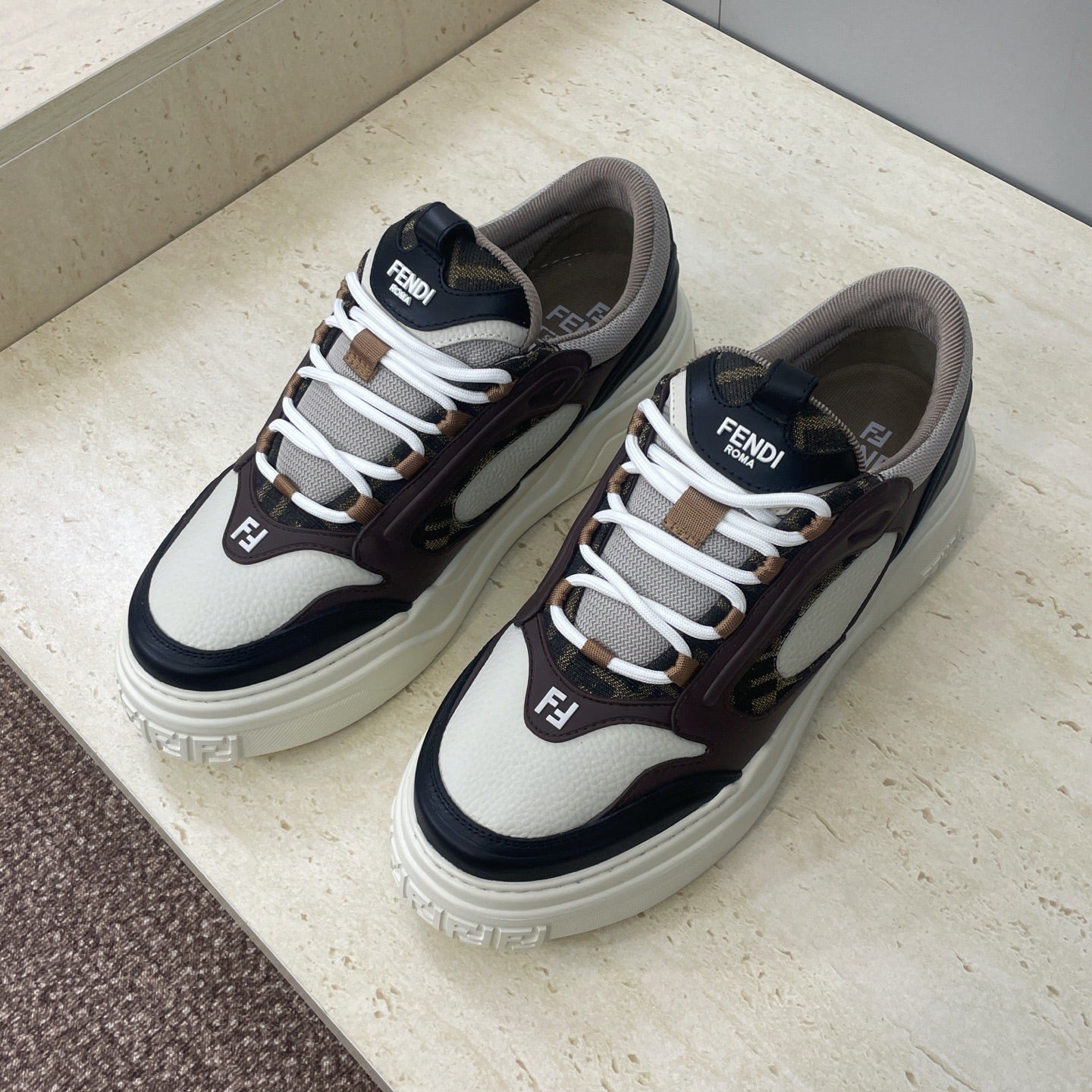 Unisex sneakers side view, white uppers with dark brown and navy accents