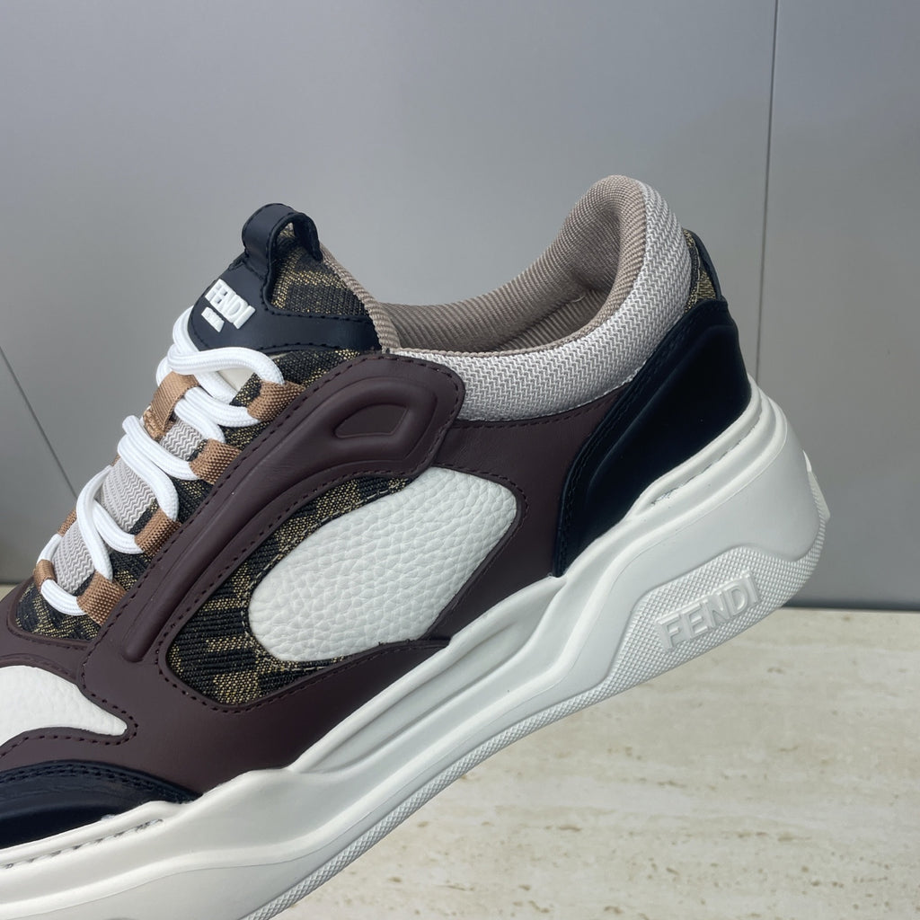 Unisex sneaker close-up side, white lace with dark brown overlay and beige lining