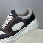 Unisex sneaker close-up side, white lace with dark brown overlay and beige lining