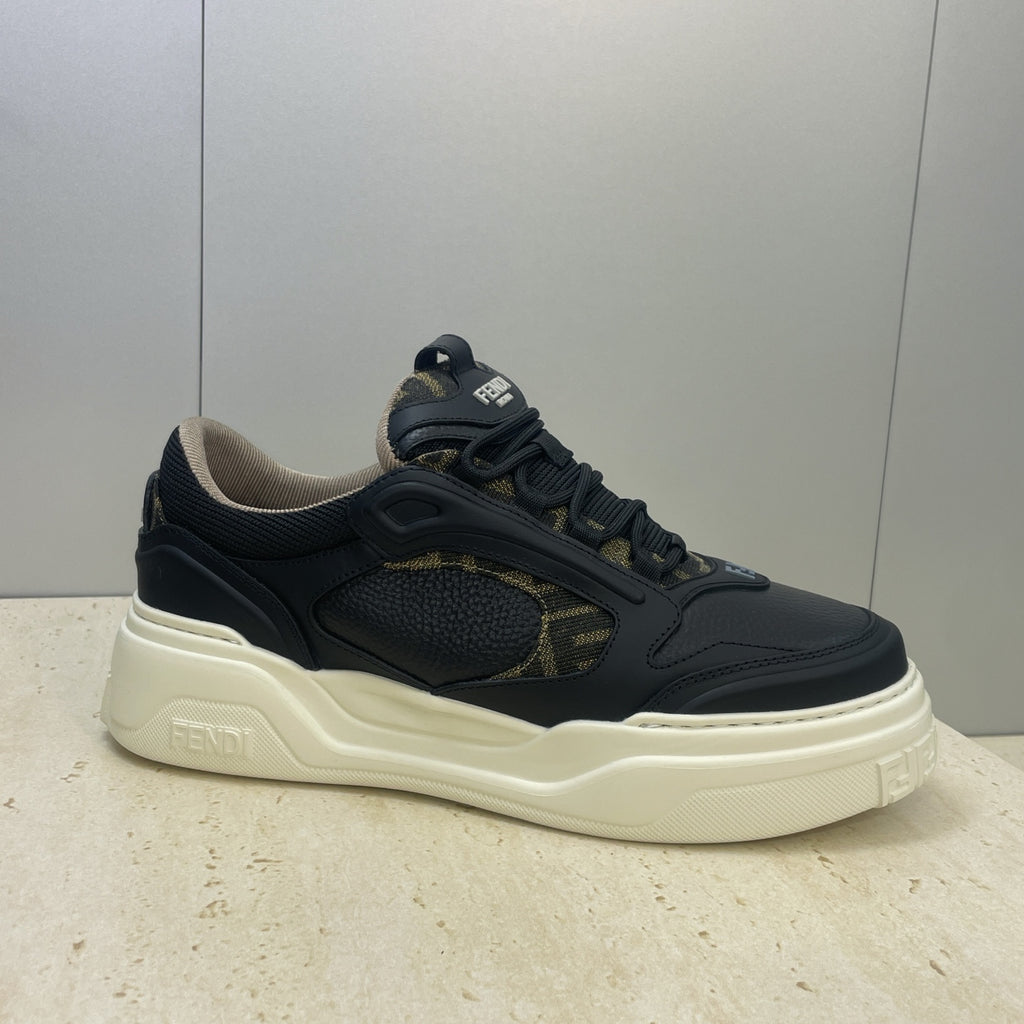 Fendi unisex sneakers, dark navy with gold logo patch and chunky cream-white sole