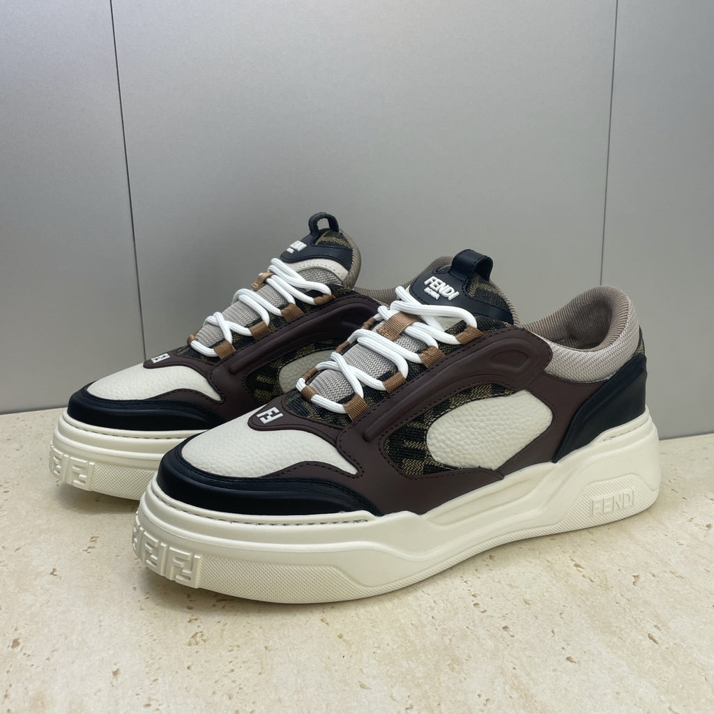 Unisex sneakers three-quarter view, white and dark brown upper with thick cream sole