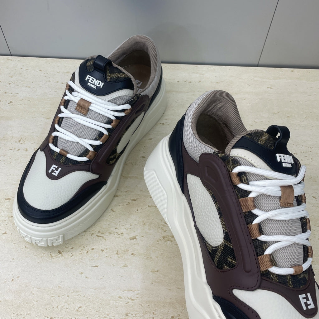Unisex sneakers close side, white laces with dark brown leather and navy toe cap