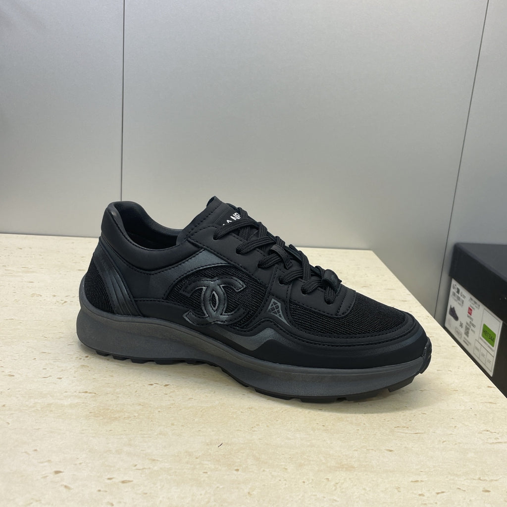 Chanel unisex low-top sneakers, dark mesh upper with lace-up and sporty rubber sole
