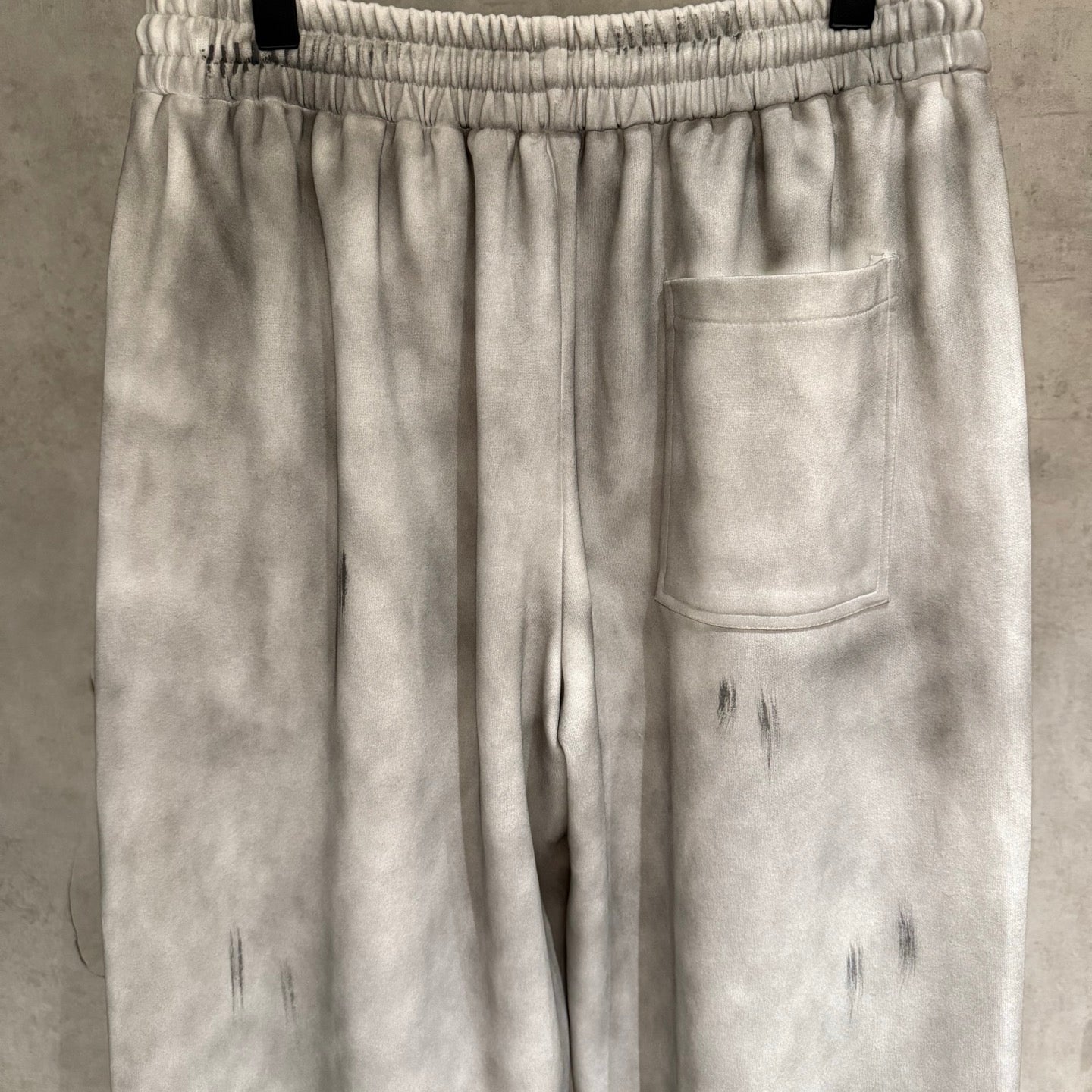 Light gray Chrome pants with elastic waistband and front patch pocket