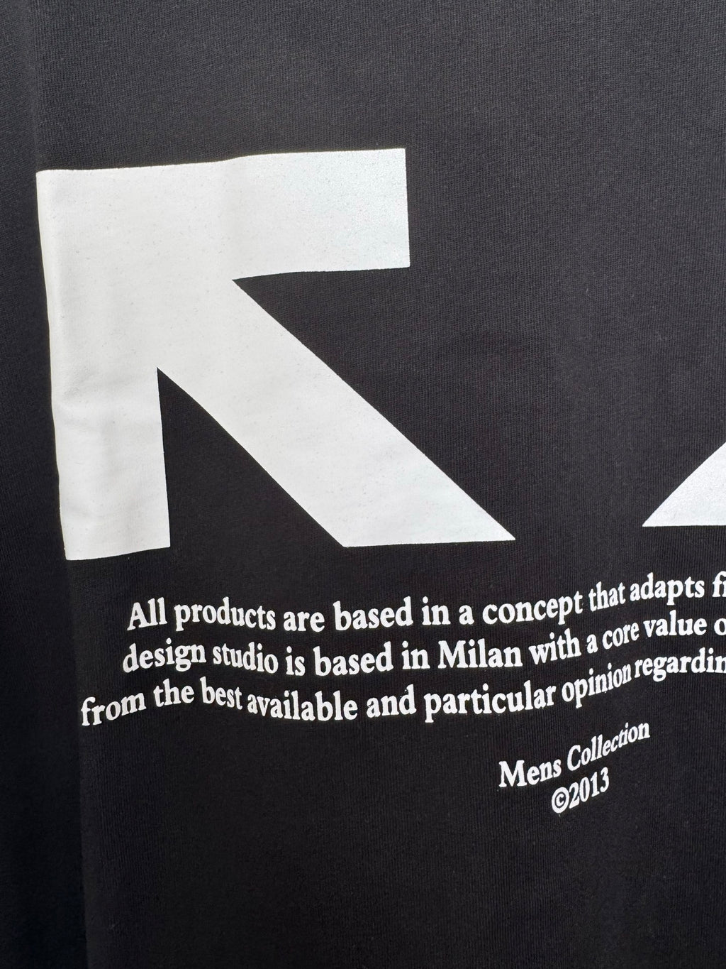 Off-White black T-shirt fabric with white text and arrow graphic