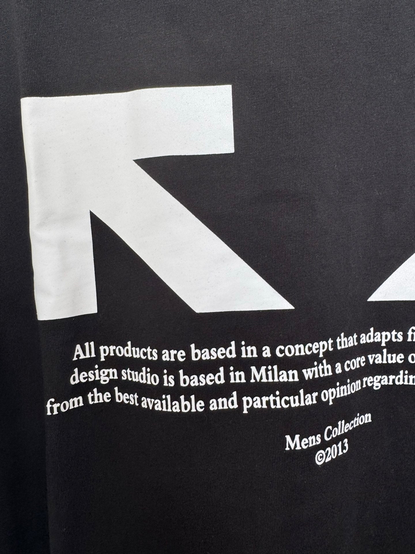 Off-White black T-shirt fabric with white text and arrow graphic