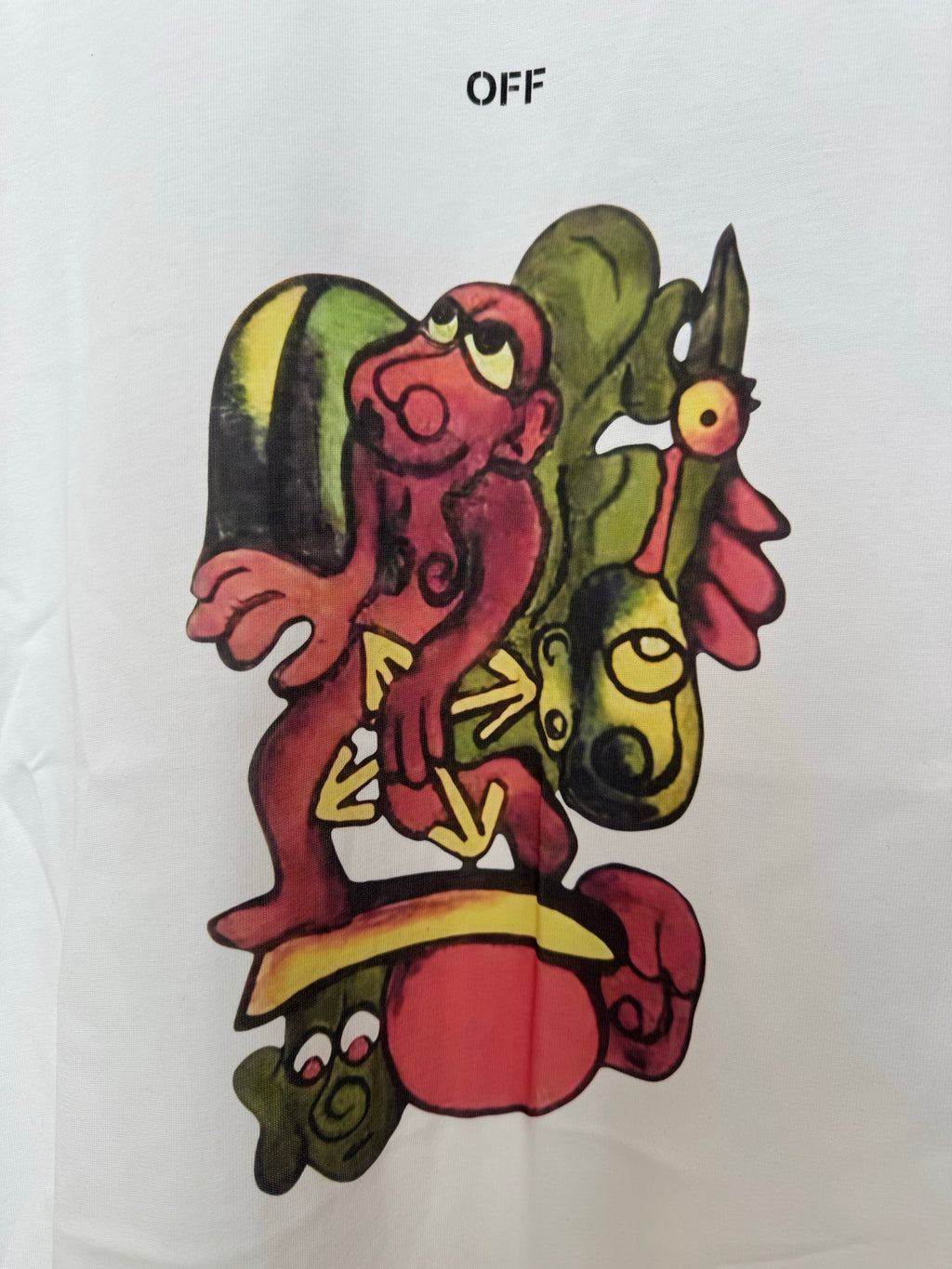 Off White T-shirt with large colorful character graphic on front