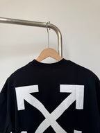 Black T-shirt back view with white 'X' arrows graphic, centered