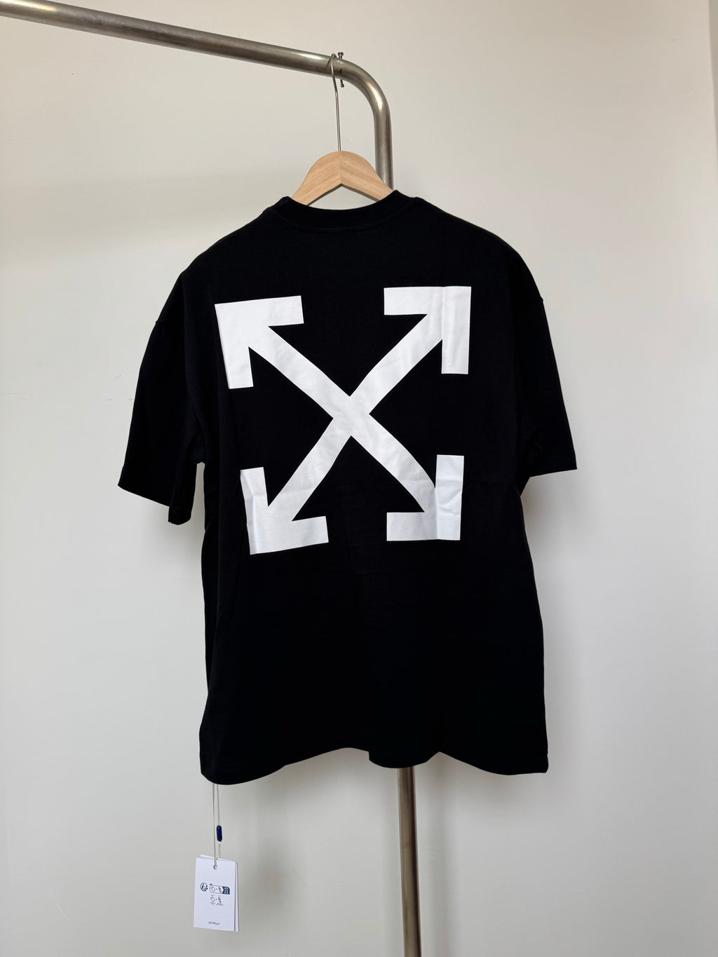 Off White dark T-shirt with large white X-arrow graphic on back
