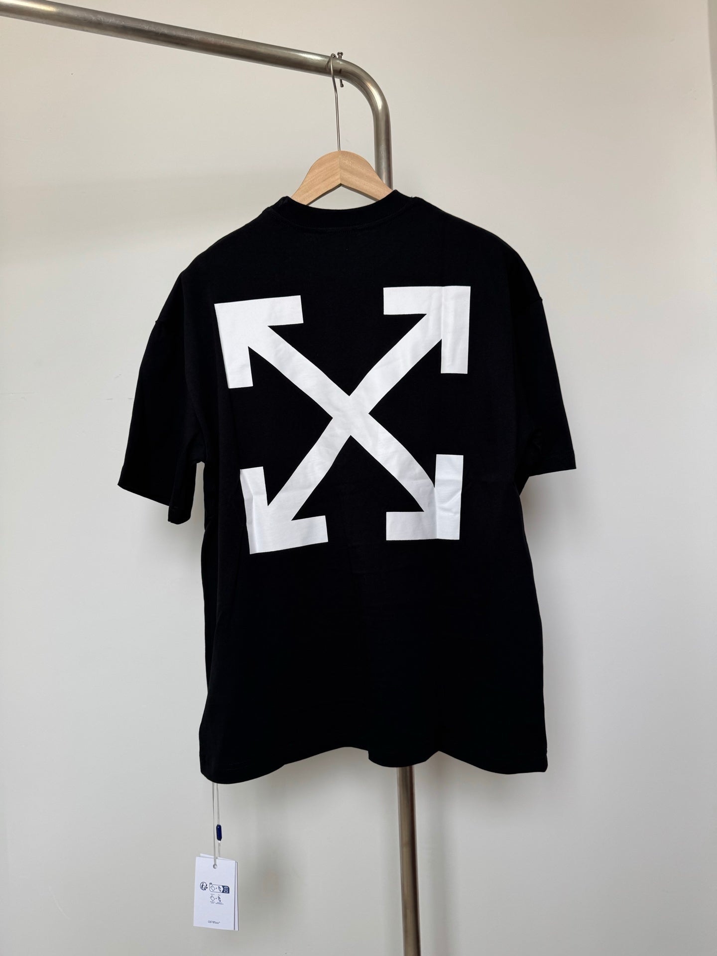 Off White dark T-shirt with large white X-arrow graphic on back
