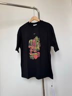Black T-shirt with multicolor cartoon graphic and small 'OFF' print on chest