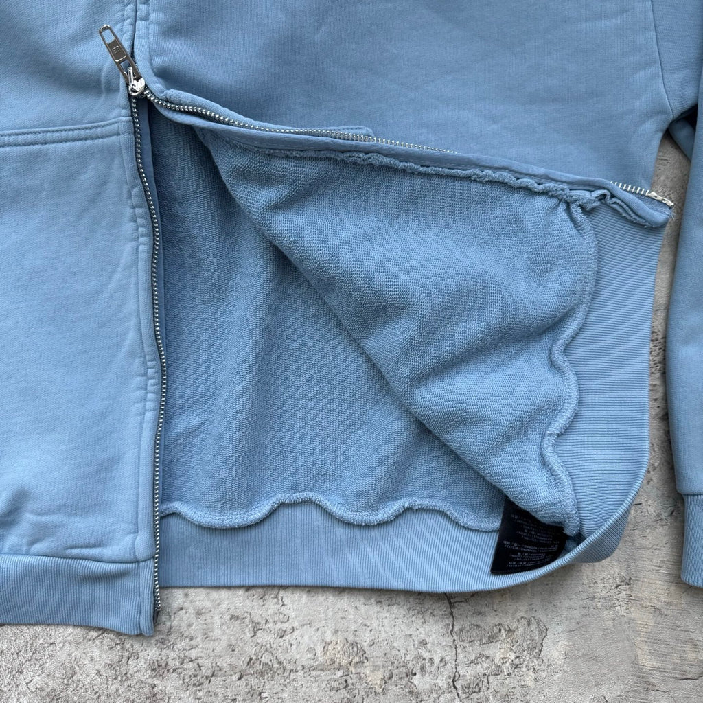 Balenciaga light blue hoodie detail with stitched seam and zipper edge
