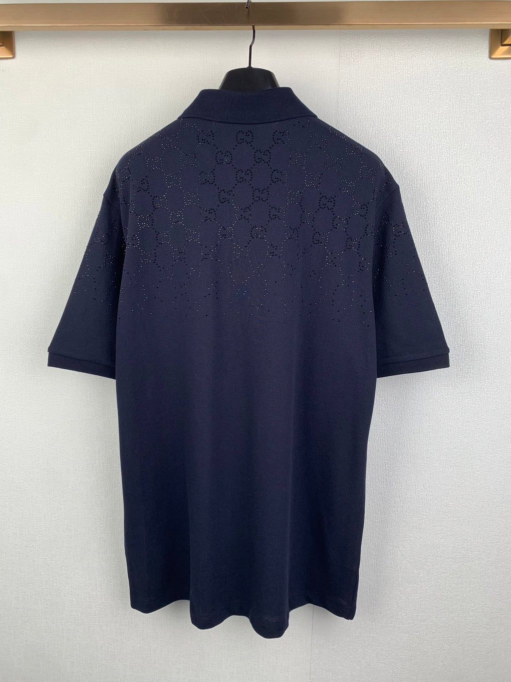 Navy polo shirt back with allover GG pattern and short sleeves