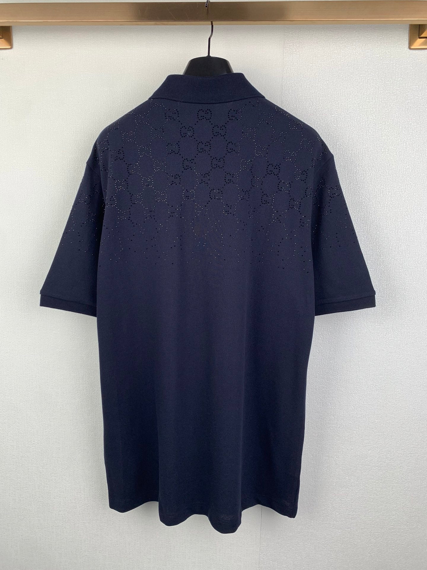 Navy polo shirt back with allover GG pattern and short sleeves