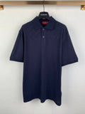 Navy Gucci polo shirt with allover GG pattern, short sleeves, button placket