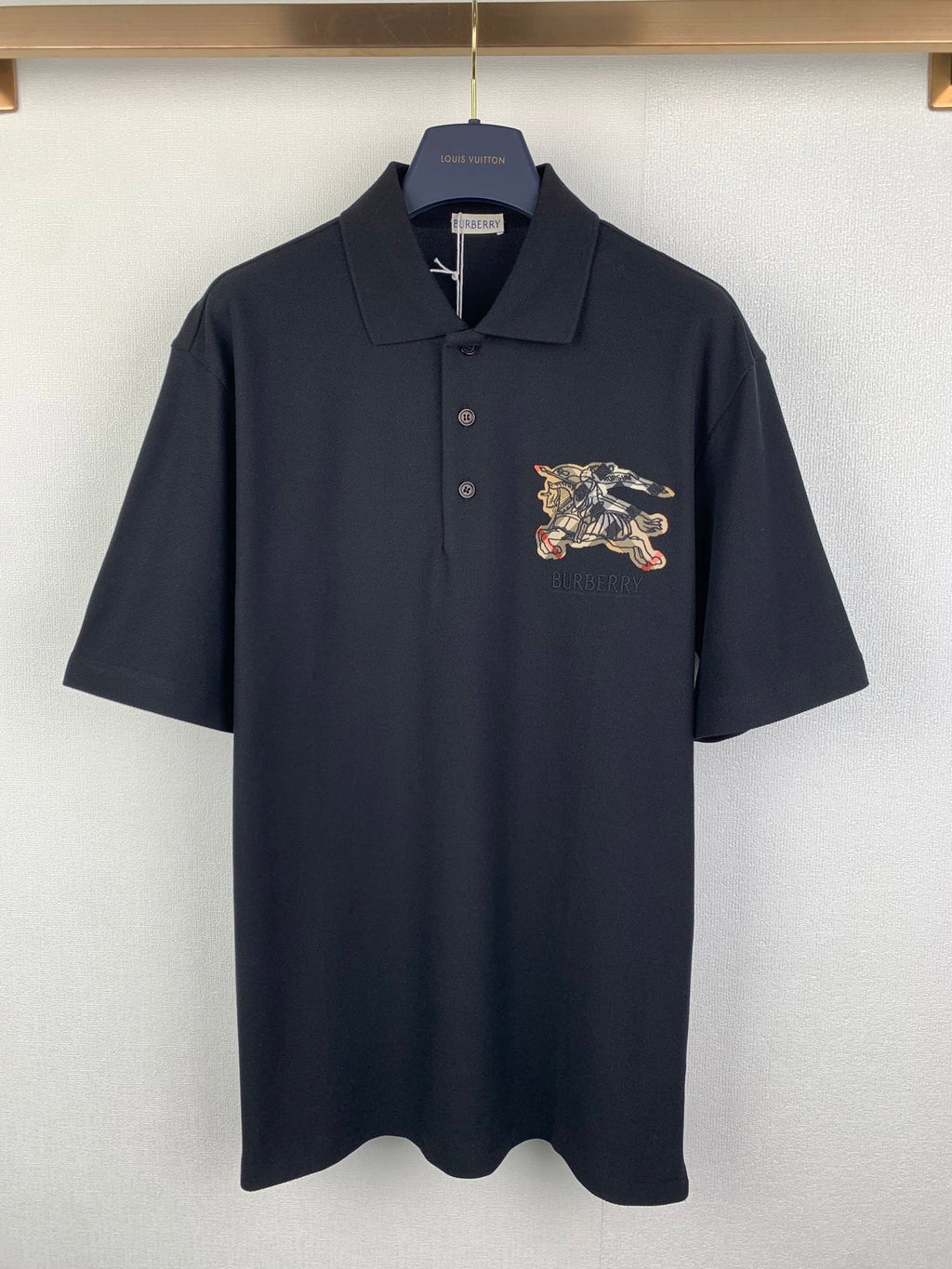Navy Burberry short-sleeve polo shirt with embroidered horse logo on chest