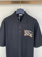 Navy Burberry polo shirt with button placket and chest horse emblem