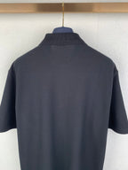 Navy Burberry polo shirt back view with stand collar and short sleeves