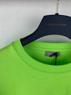 Neon green T-shirt crew neck detail with inner label