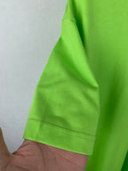 Neon green short-sleeve T-shirt sleeve hem detail