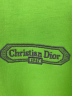 Green T-shirt with embroidered 'Christian Dior' logo patch