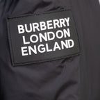 Burberry London England logo label on black puffer jacket
