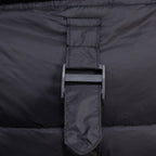 Black puffer vest back yoke with hanging hood tie and central label tag