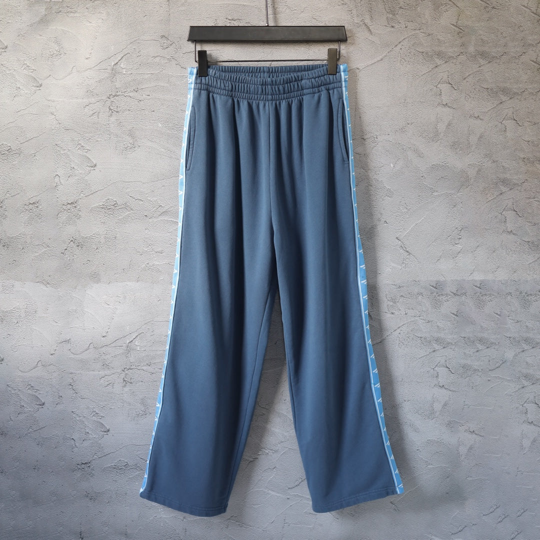 Blue wide-leg pants with elastic waistband and contrast side stripe