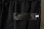 Balenciaga black pants with care label patch on interior waistband