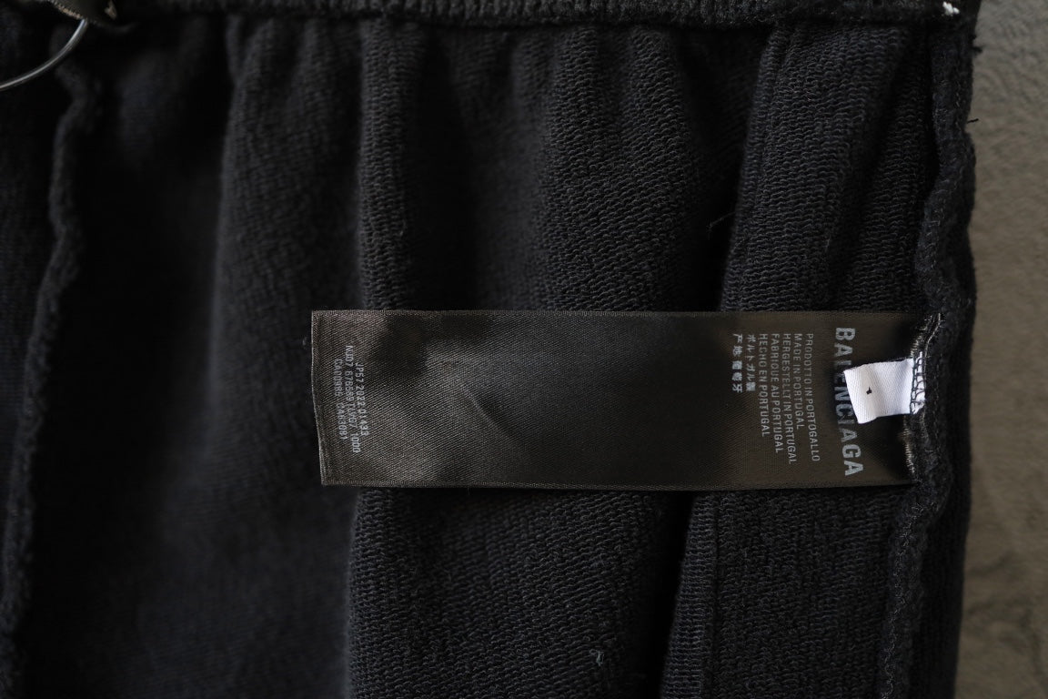 Balenciaga black pants with care label patch on interior waistband