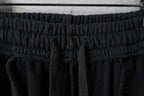 Balenciaga black track pants with gathered elastic waistband and drawstring