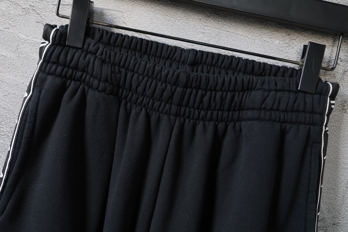 Balenciaga pants waistband with gathered elastic and white side piping, black