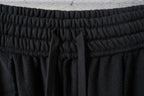 Balenciaga black elastic waistband with gathered stitching and hidden drawstring ends