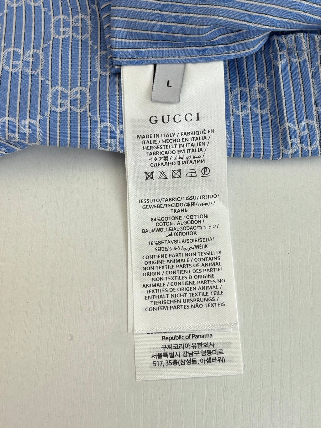 Gucci size L care label on shirt, made in Italy