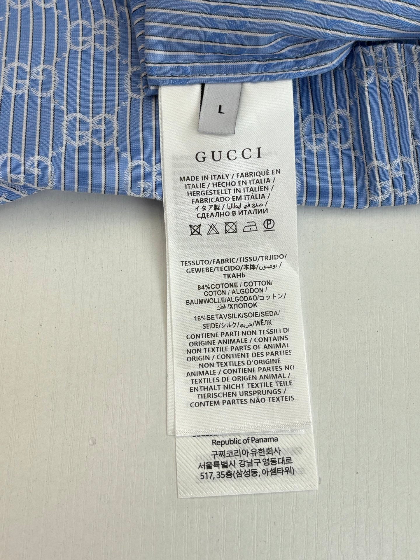 Gucci size L care label on shirt, made in Italy