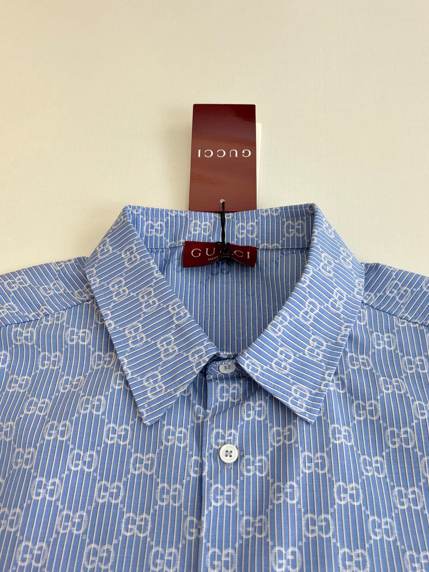 Blue Gucci long-sleeve shirt with allover logo pattern, buttoned collar